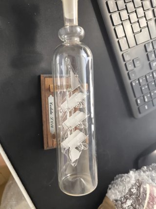 Corbeta en botella de cristal