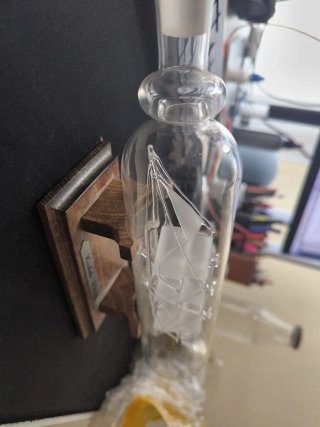 Corbeta en botella de cristal