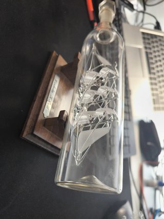 Corbeta en botella de cristal