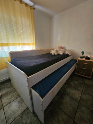 Cama nido blanca.