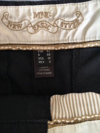 Falda negra Mango Talla 42 con abertura