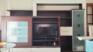 Mueble librería salón madera y cristal