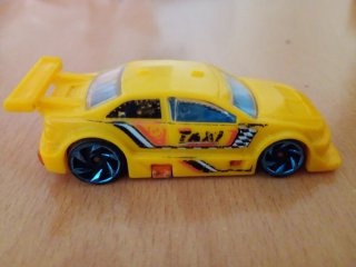 Coche de juguete taxi amarillo Hot Wheels
