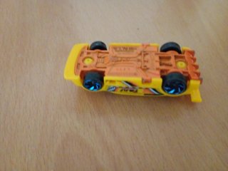 Coche de juguete taxi amarillo Hot Wheels