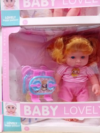 Muñeca Baby Lovely con accesorios