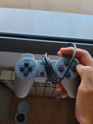 PlayStation Mini Original con 2 mandos