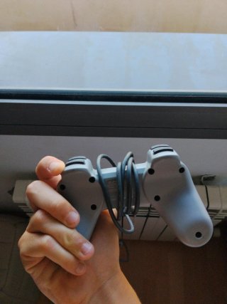 PlayStation Mini Original con 2 mandos