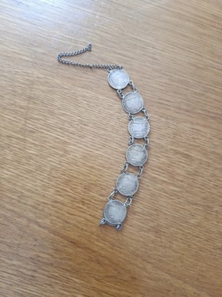 Pulsera de monedas de plata