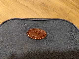 Neceser de viaje azul y marrón