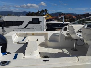 Barco con Motor Fueraborda Mercury
