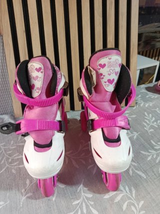 Patines ajustables rosas y blancos