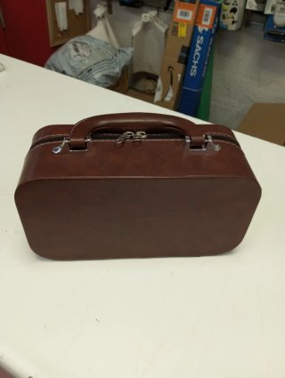 Tetera con maletín de viaje