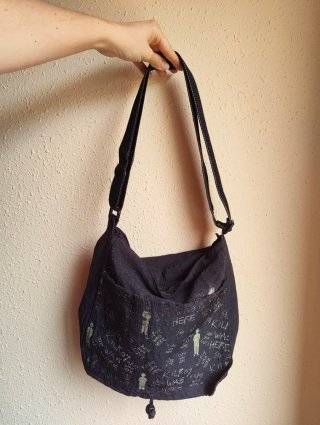 Bolso negro con estampado Kilroy Was Here