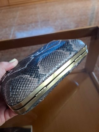 Bolso clutch estampado piel serpiente