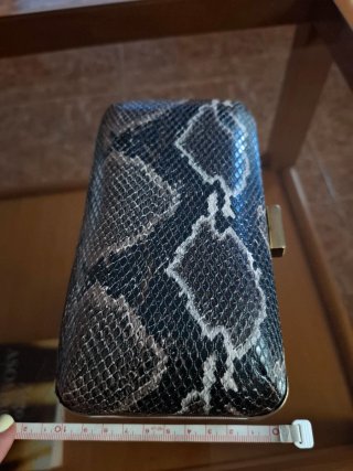 Bolso clutch estampado piel serpiente