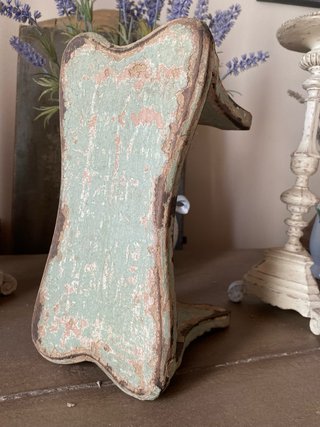 Sgabello fiocco in patina antica