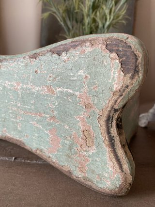 Sgabello fiocco in patina antica