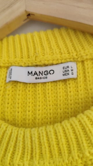 Jersey de punto amarillo con detalles
