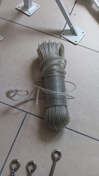 KIT DE TENDEDERO DE PARED EXTERIOR SIN USAR. 25€.