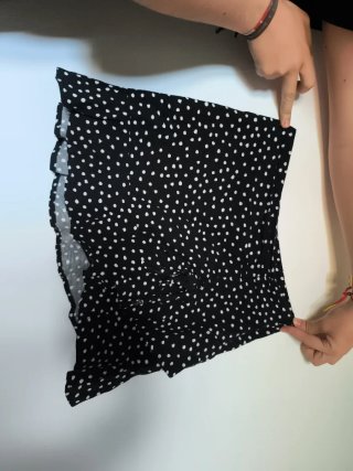 Minifalda lunares negra talla 32