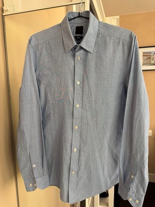 Camisa H&M azul claro de la talla S.