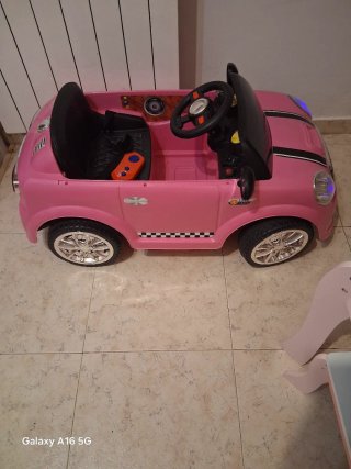 Coche de batería y manual rosa