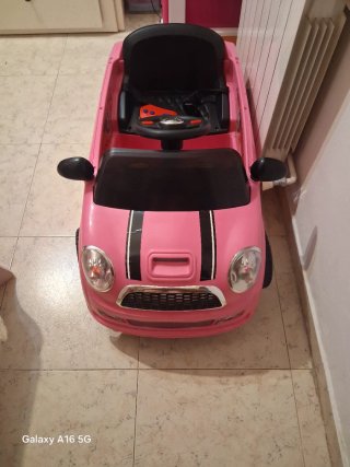 Coche de batería y manual rosa