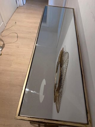 Mesa consola metal y cristal dorada