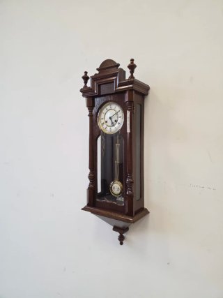 Orologio da parete meccanico antico