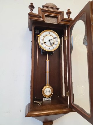 Orologio da parete meccanico antico