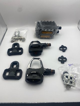 Juego de pedales y calas para bicicleta
