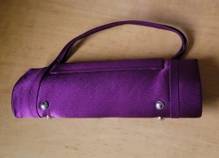 Bolso morado de fiesta con lazo