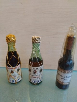 Miniature di antiche bottiglie