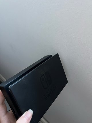 Nintendo Switch con dos pares de mados