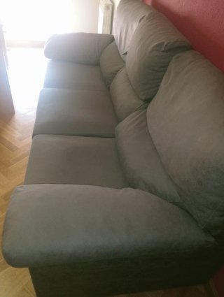 Sofá gris de tela