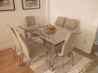 Mesa de comedor extensible de cristal y 6 sillas