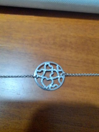 Braccialetto con ciondolo a cuore. In argento.