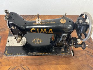 Máquina de coser Cima antigua