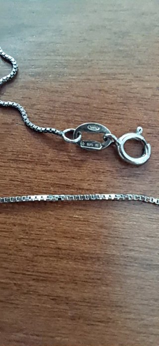 Collana con ciondolo luminoso