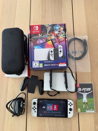 Nintendo Switch OLED Bianca + EA Sports FC 25