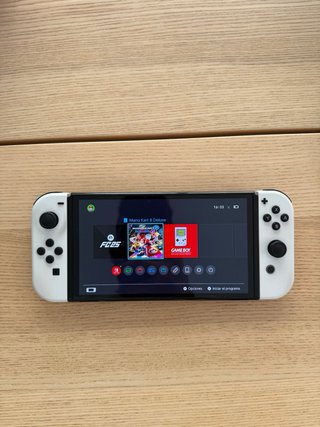Nintendo Switch OLED Bianca + EA Sports FC 25