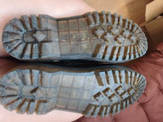 Botas negras con cordones y cremallera