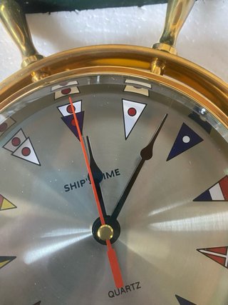 Reloj náutico timón de barco