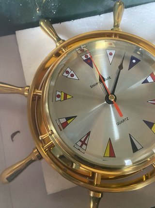 Reloj náutico timón de barco