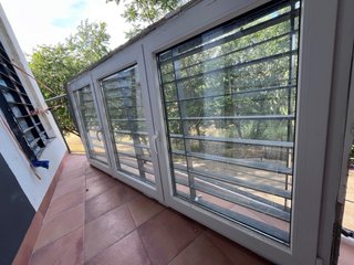 Ventanas aluminio Climalit y rejas de seguridad