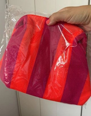 Bolso clutch rayas rosa y rojo