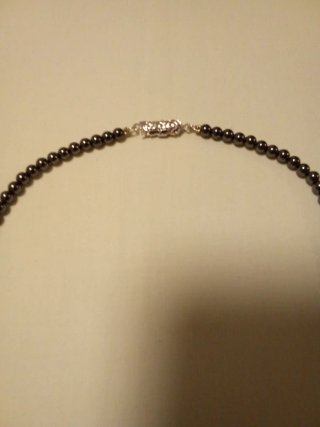 Collar de cuentas y diseño abanico