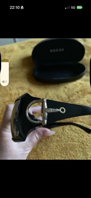 Occhiali da sole Gucci neri e dorati