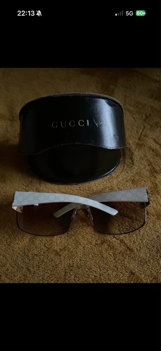 Occhiali da sole Gucci marroni e bianchi