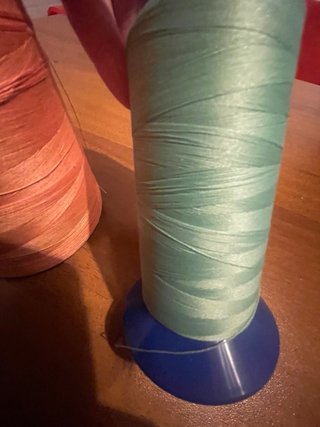 Set 2 rocchetti filo arancione e verde